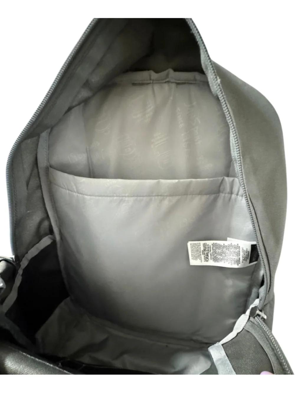 Jansport Grey Backpack with side pocket grey, top zip and front pocket. Light